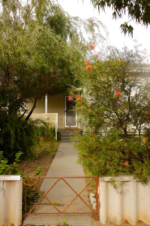 Charming Cottage Living on Generous Block